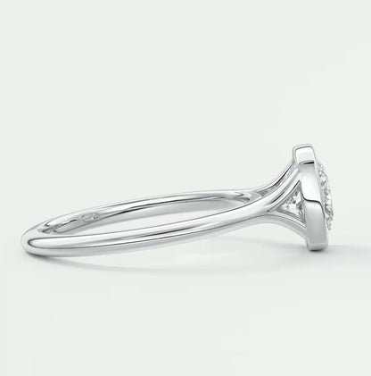 18k white gold diamond engagement ring with a halo design.