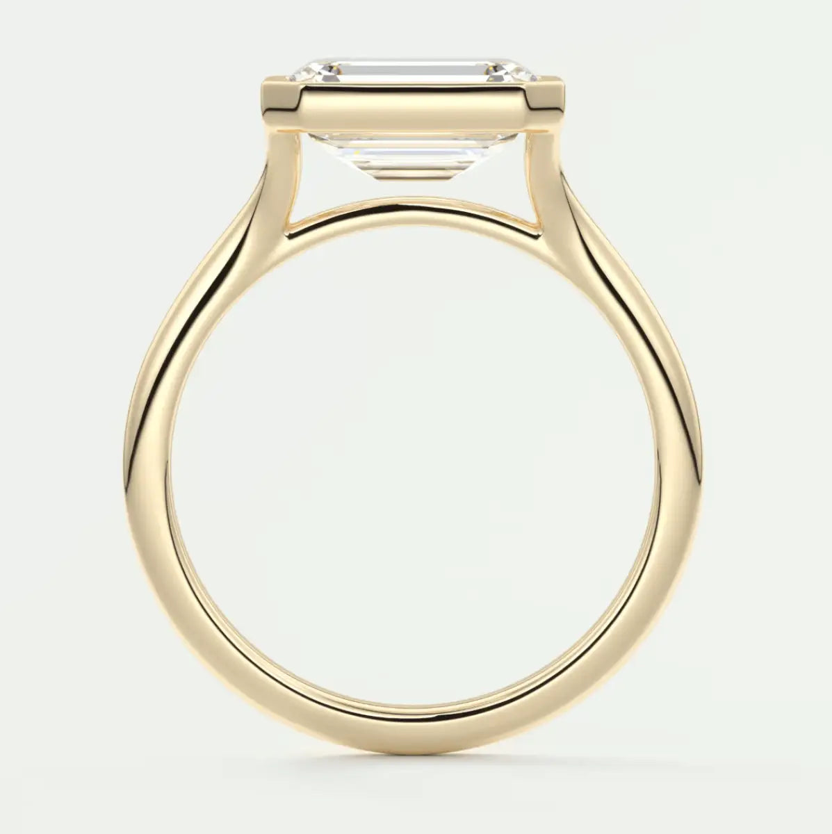 18k yellow gold emerald cut diamond engagement ring.