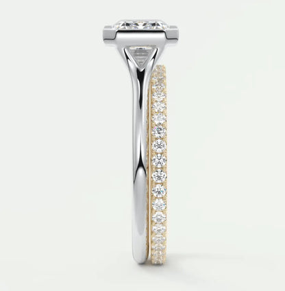 18k gold and diamond engagement ring with a square-shaped center stone.