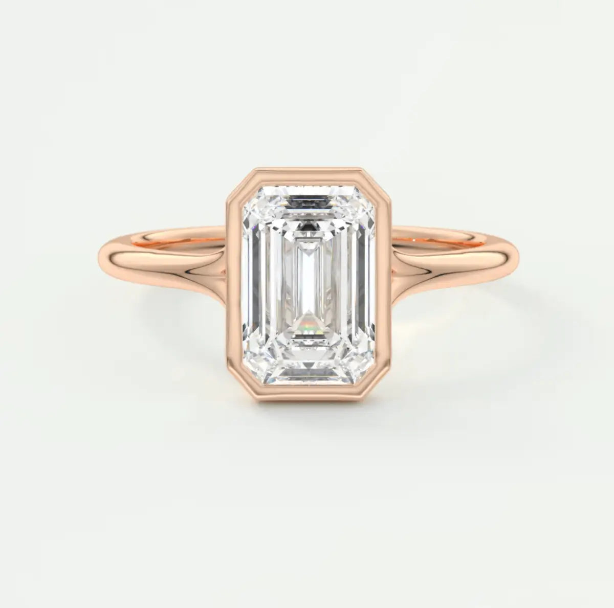 18k rose gold emerald cut diamond engagement ring.