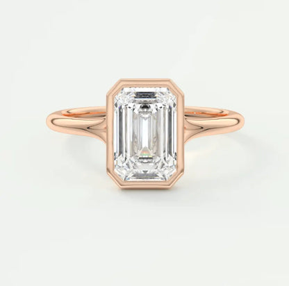 18k rose gold emerald cut diamond engagement ring.