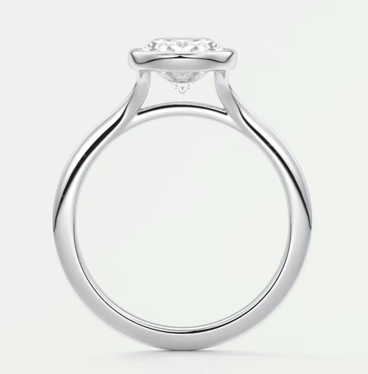 White gold diamond engagement ring with a halo design and prong setting.