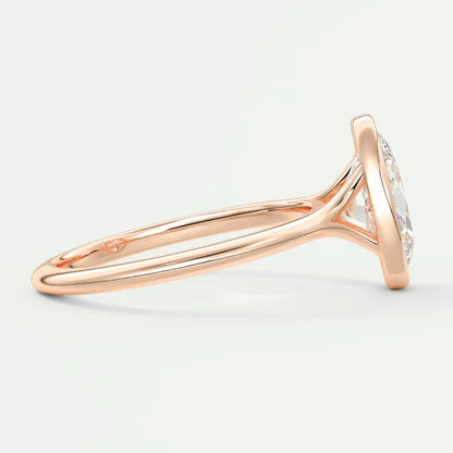 Rose gold diamond engagement ring with a halo setting and intricate band design.