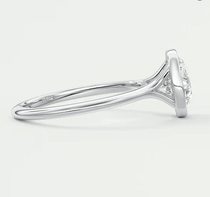 18k white gold diamond engagement ring with a halo setting.