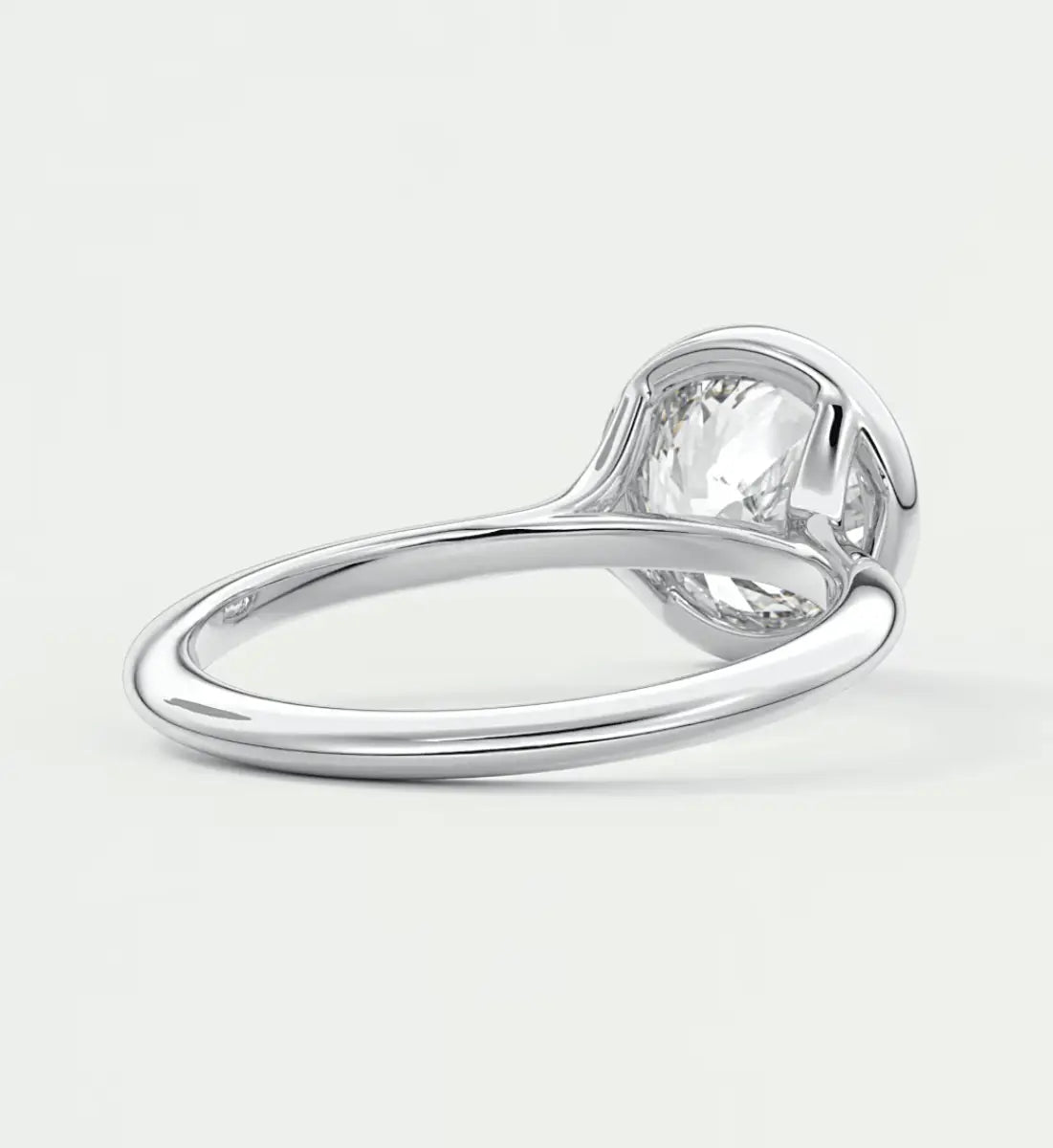 White gold engagement ring with a heart-shaped diamond.