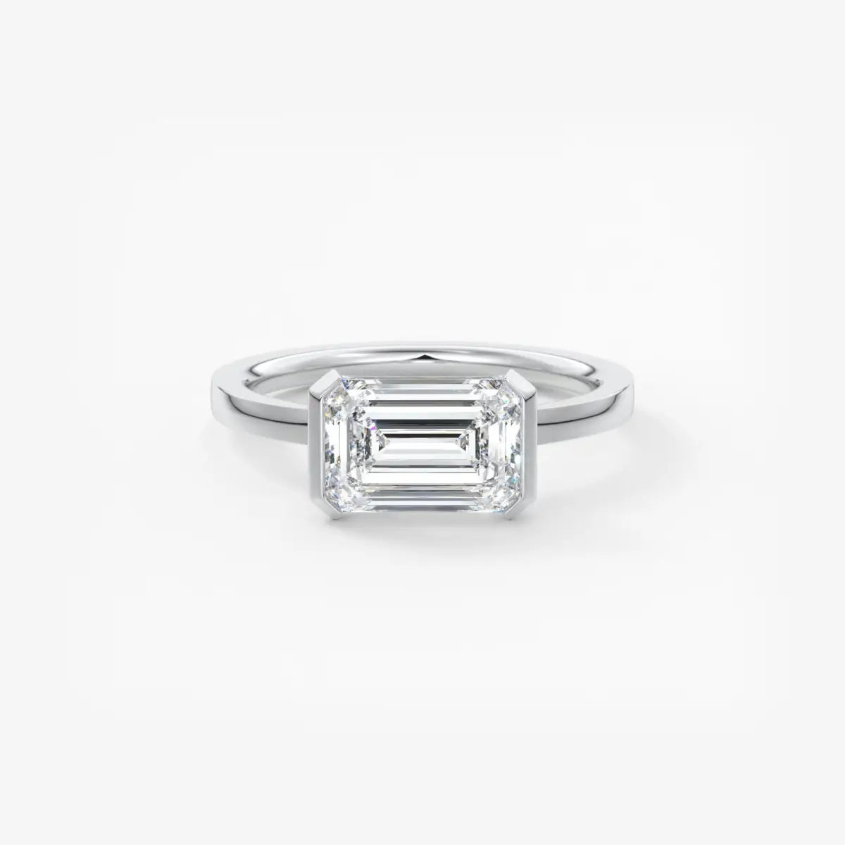 Custom made alosta emerald east-west half bezel engagement ring | lab diamond or moissanite