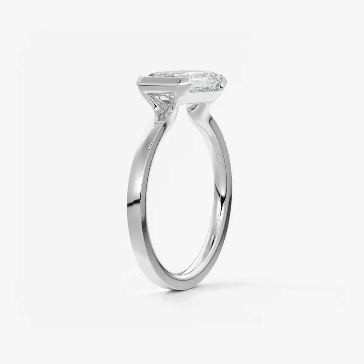 Custom made alosta emerald east-west half bezel engagement ring | lab diamond or moissanite