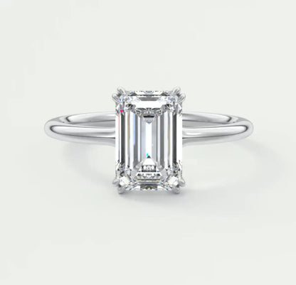 18k white gold emerald cut diamond engagement ring.