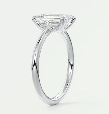 18k white gold emerald cut diamond engagement ring.