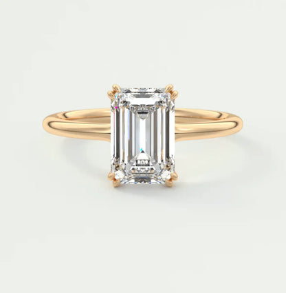 18k yellow gold emerald cut diamond engagement ring.