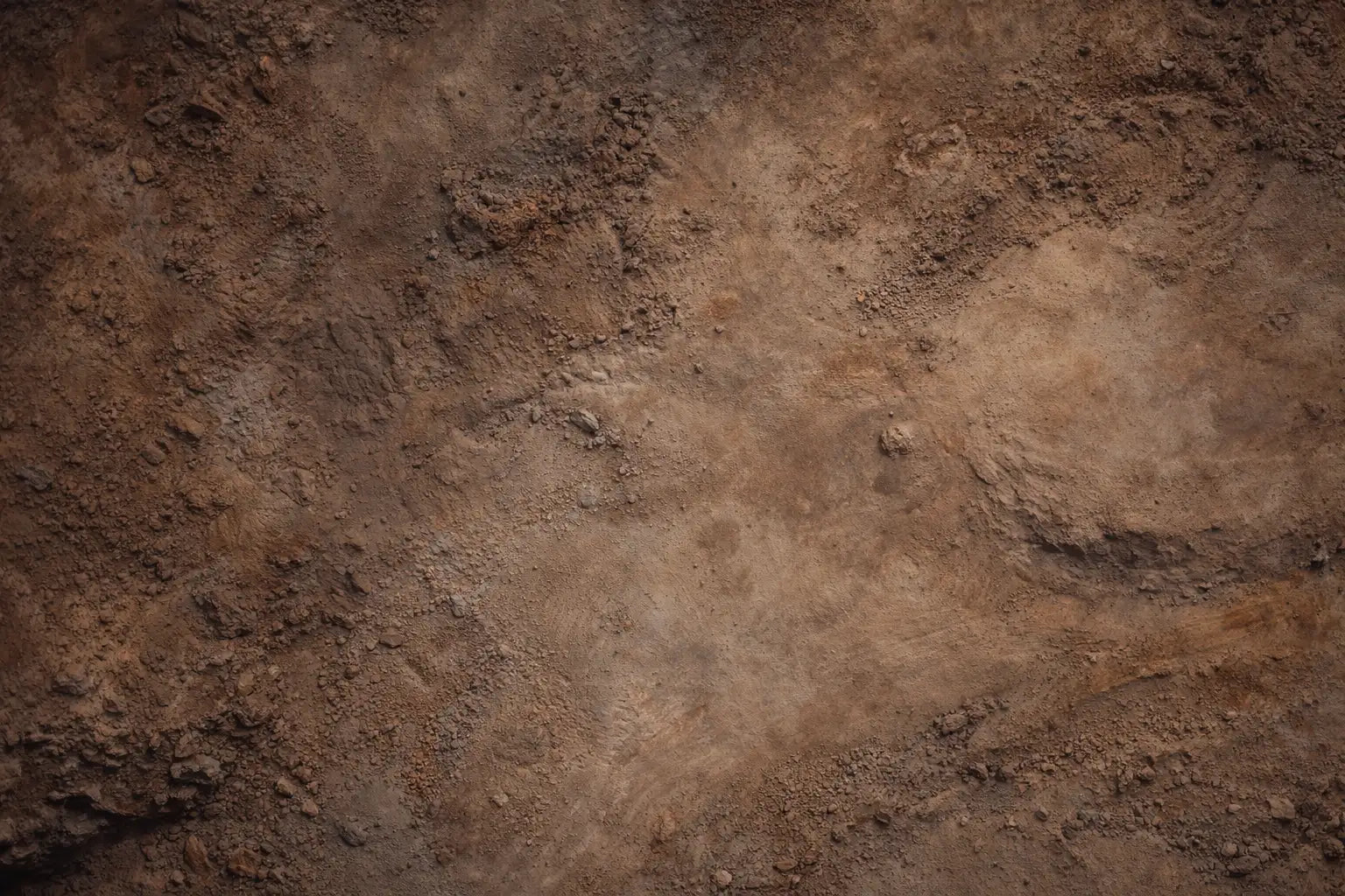 Textured brown surface resembling soil or stone