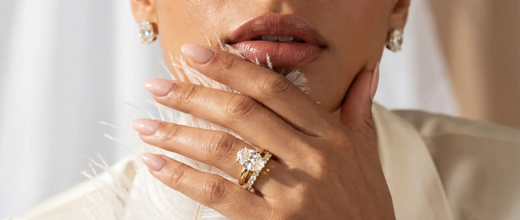 oval lab diamond engagement ring on model for VYOR