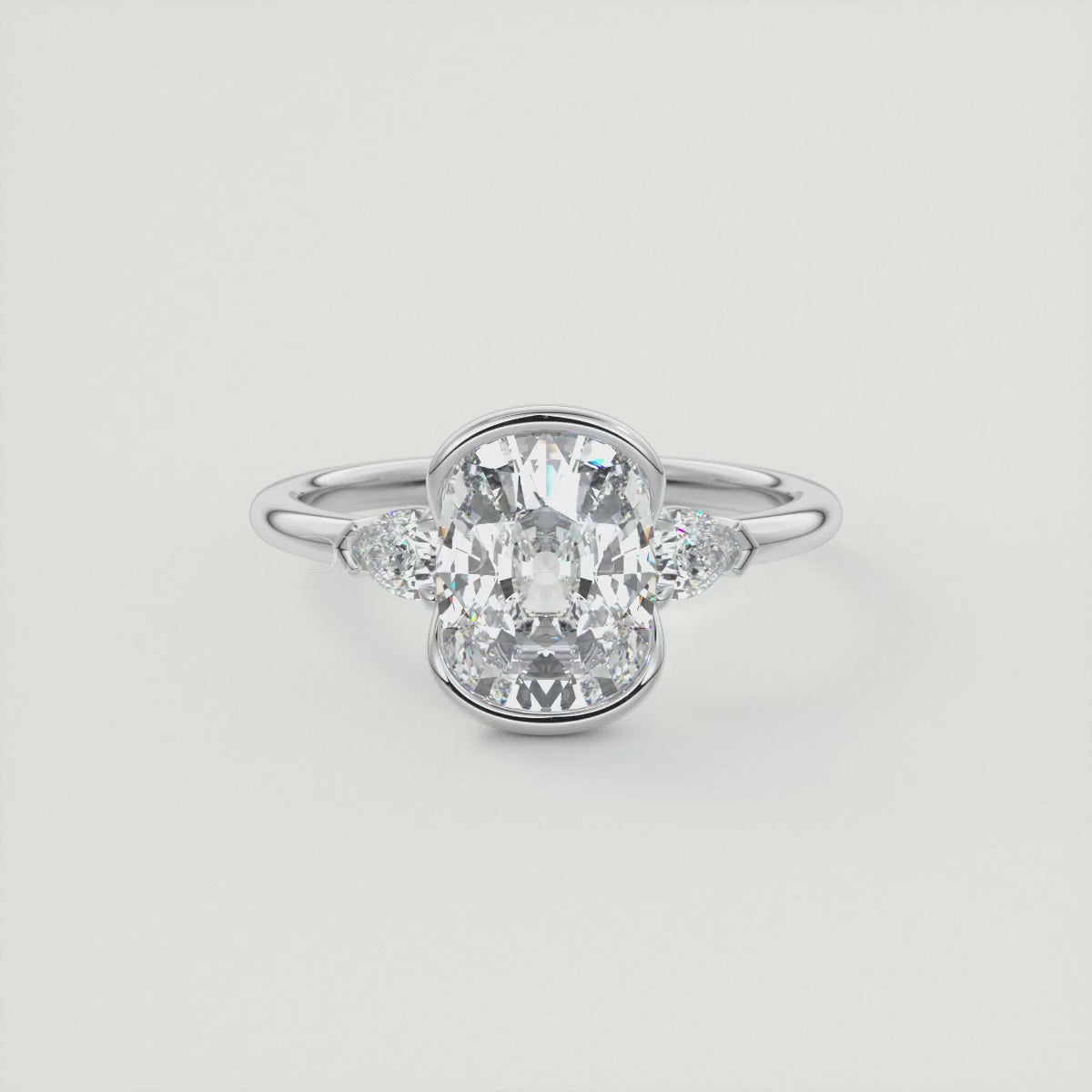 Solara Elongated Cushion Half Bezel Three-Stone Engagement Ring