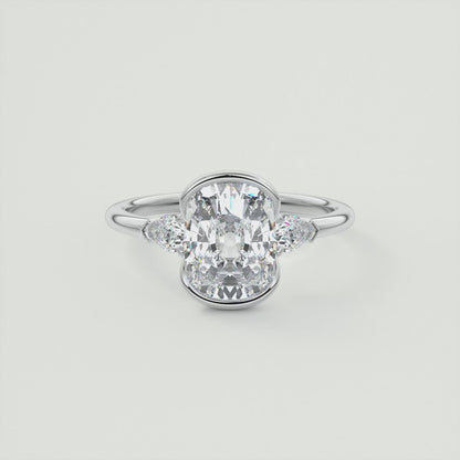 Solara Elongated Cushion Half Bezel Three-Stone Engagement Ring