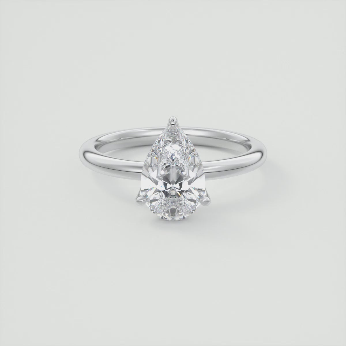 Celestia Pear Solitaire Ring – Lab Diamond or Moissanite