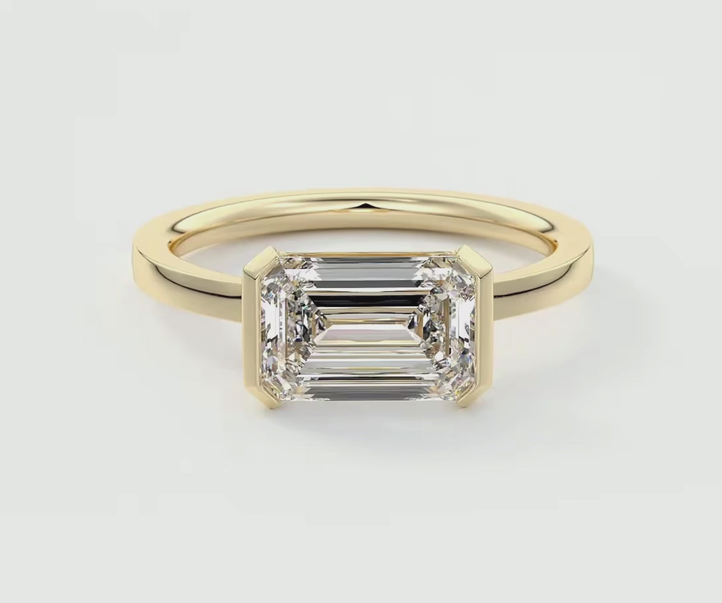 Load video: Alosta Emerald Half Bezel Engagement Ring