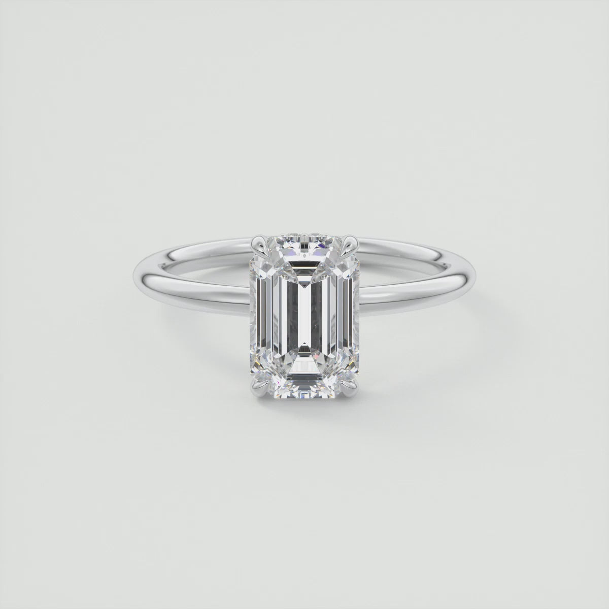 Aurora Emerald Hidden Halo Engagement Ring