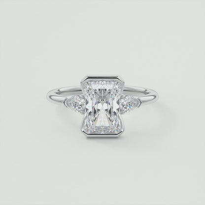 Solara Elongated Radiant Half Bezel Three-Stone Engagement Ring