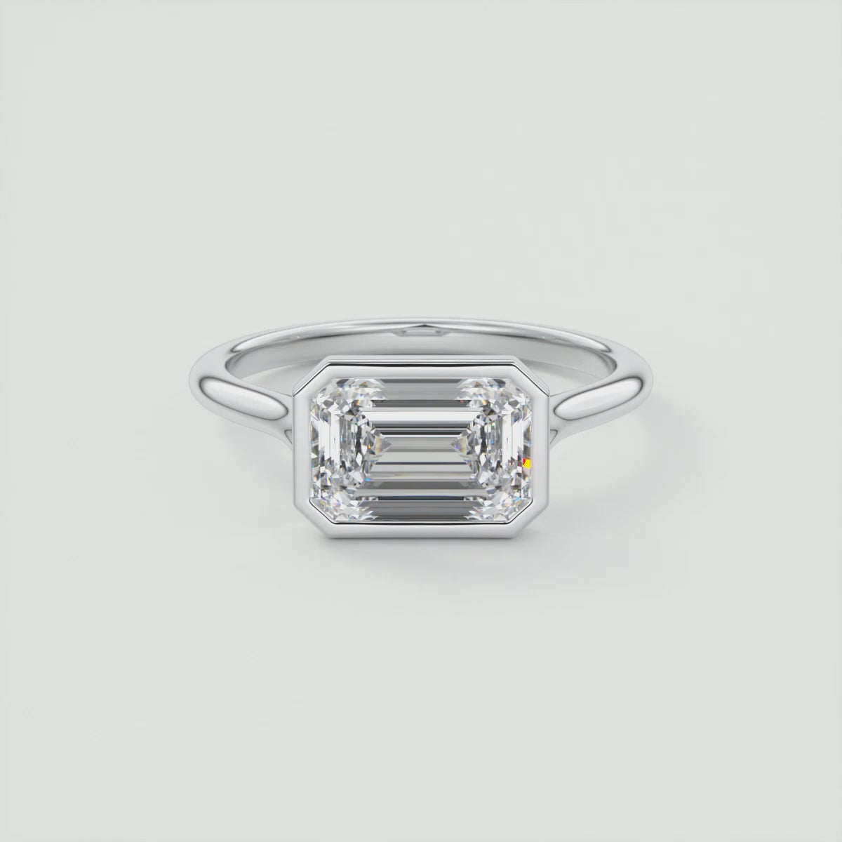 Aeris East-West Emerald Bezel Engagement Ring – Lab Diamond or Moissanite
