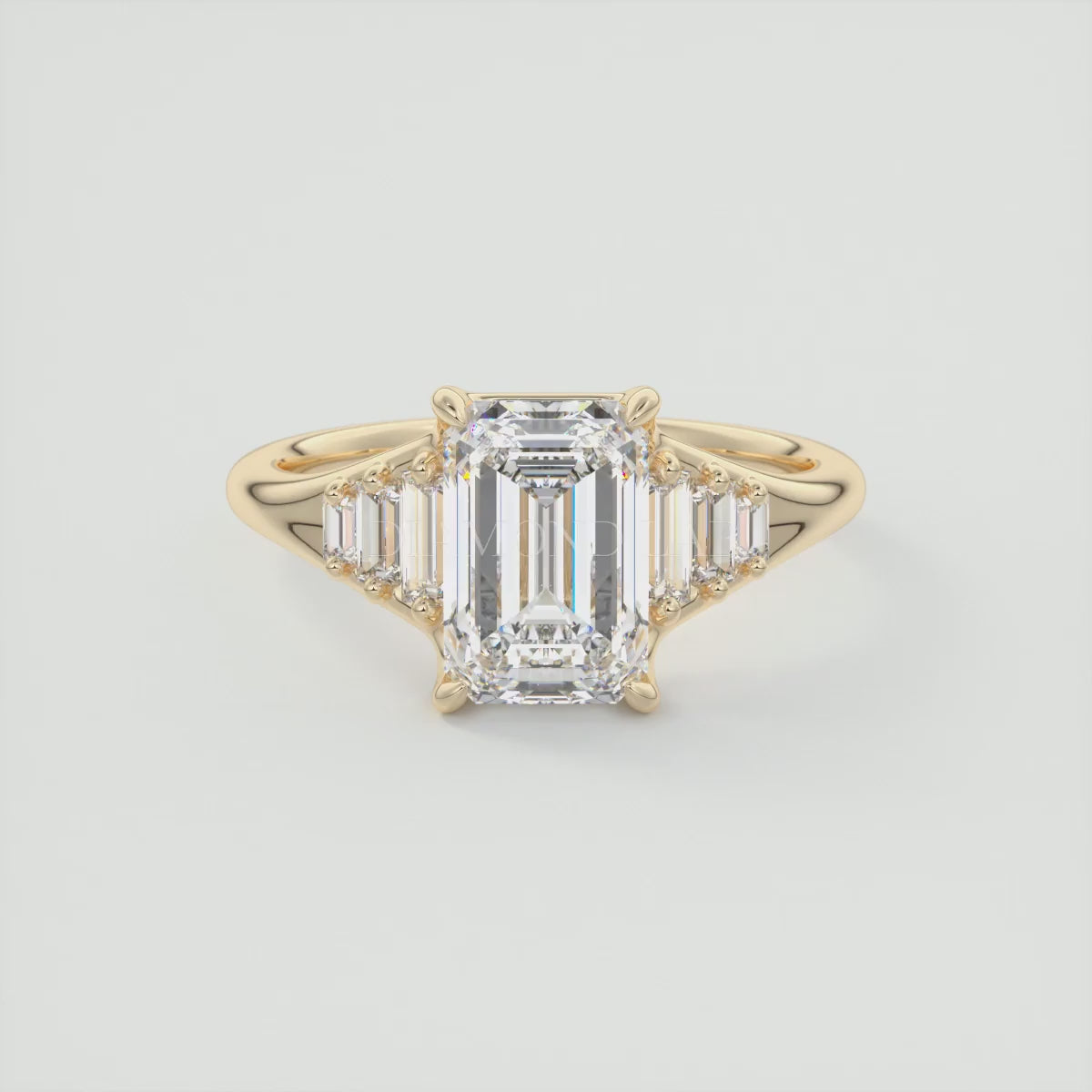 Solena Emerald Split Shank Engagement Ring with Graduated Baguette Side Stones