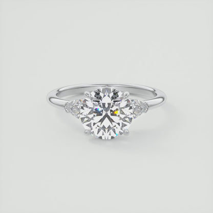 Elysian Round Three-Stone Engagement Ring with Pear Side Stones
