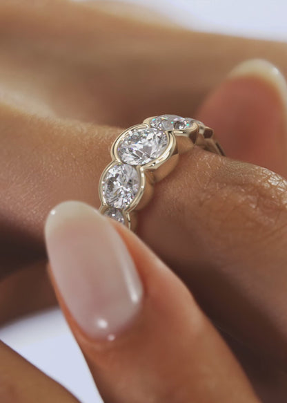 Virelle Round and Pear Half-Bezel Engagement Ring