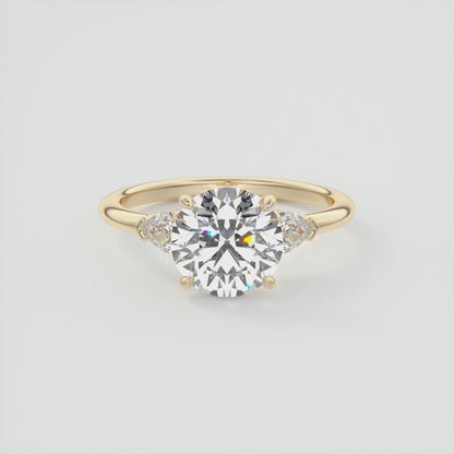 Elysian Round Three-Stone Engagement Ring with Pear Side Stones