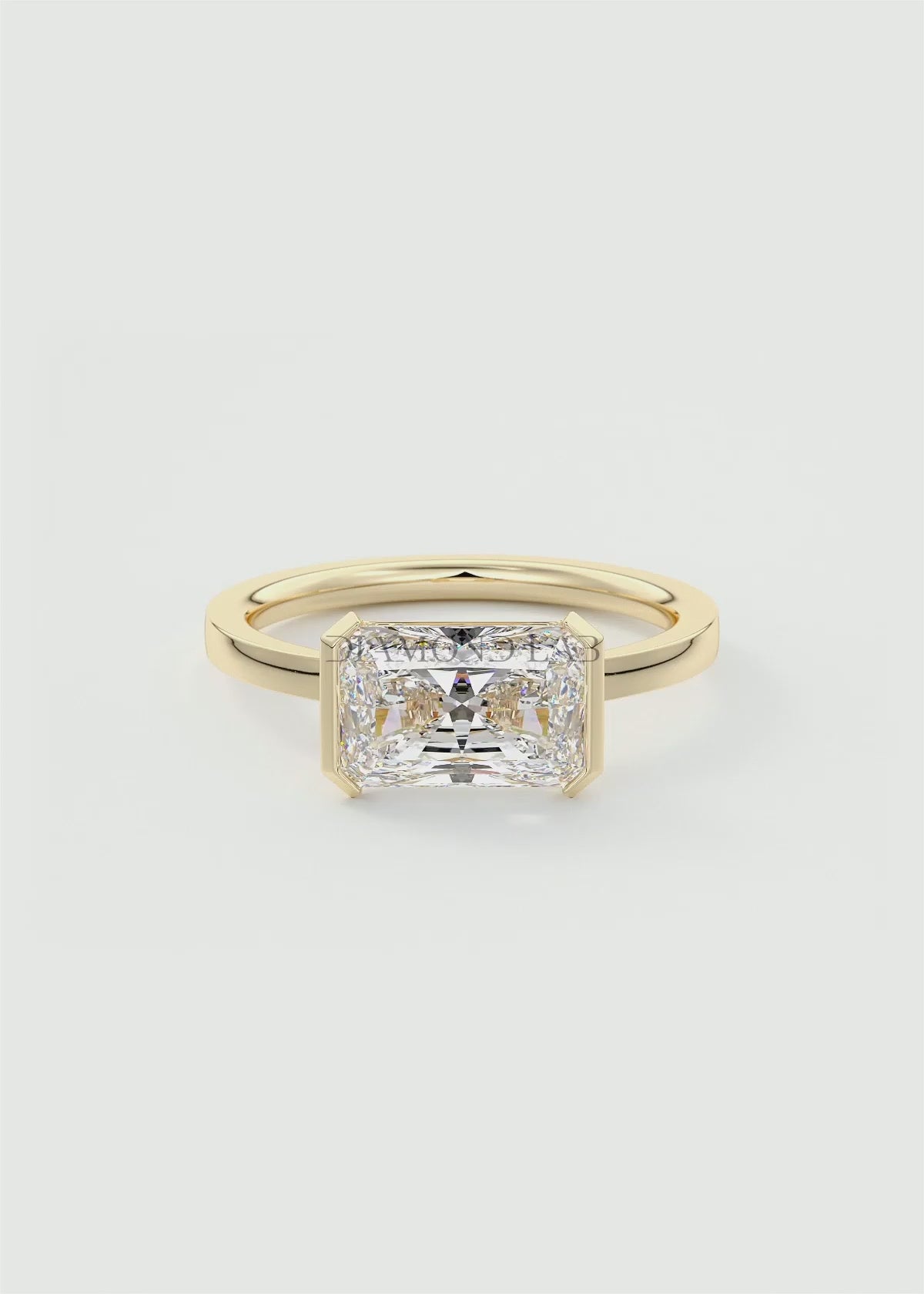 Alosta Elongated Radiant East-West Half Bezel Engagement Ring