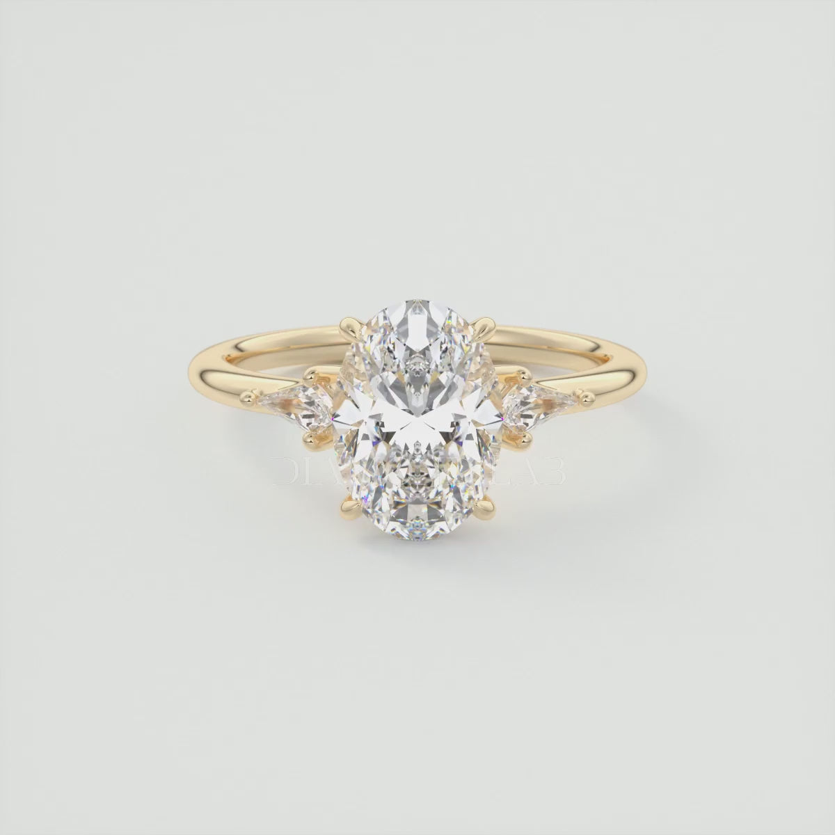 Elysian Oval Three-Stone Engagement Ring with Kite Side Stones