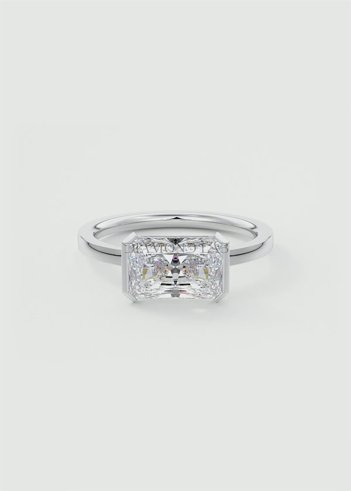 Alosta Elongated Radiant East-West Half Bezel Engagement Ring
