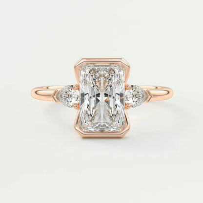 Custom made solara elongated radiant half bezel three-stone engagement ring | diamond lab