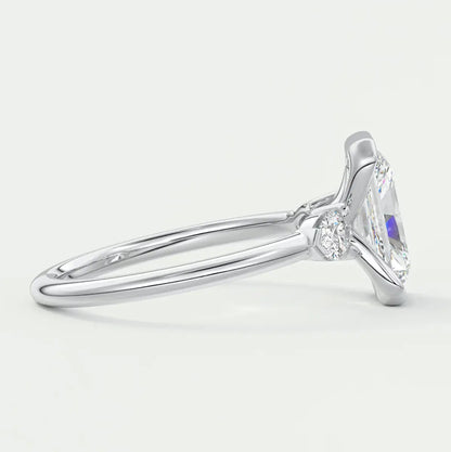 Custom made solara elongated radiant half bezel three-stone engagement ring | diamond lab