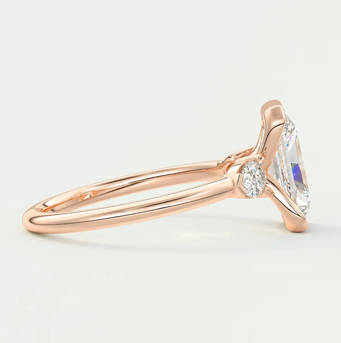 Custom made solara elongated radiant half bezel three-stone engagement ring | diamond lab