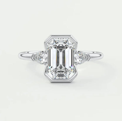 Custom made solara emerald half bezel three-stone engagement ring | diamond lab
