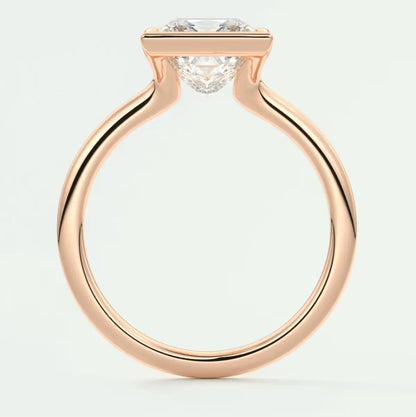 18k rose gold engagement ring with a round diamond.