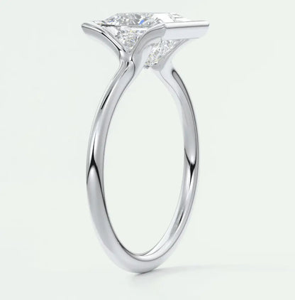 18-karat white gold engagement ring with a princess-cut diamond.
