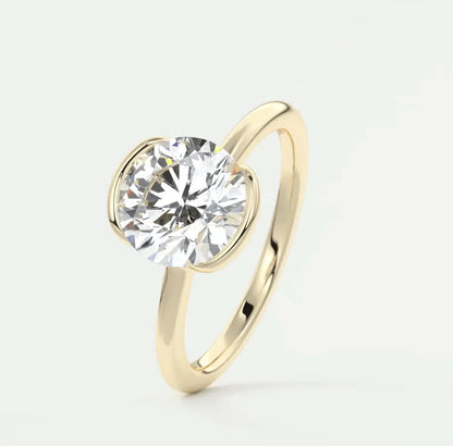 18k yellow gold solitaire diamond engagement ring.