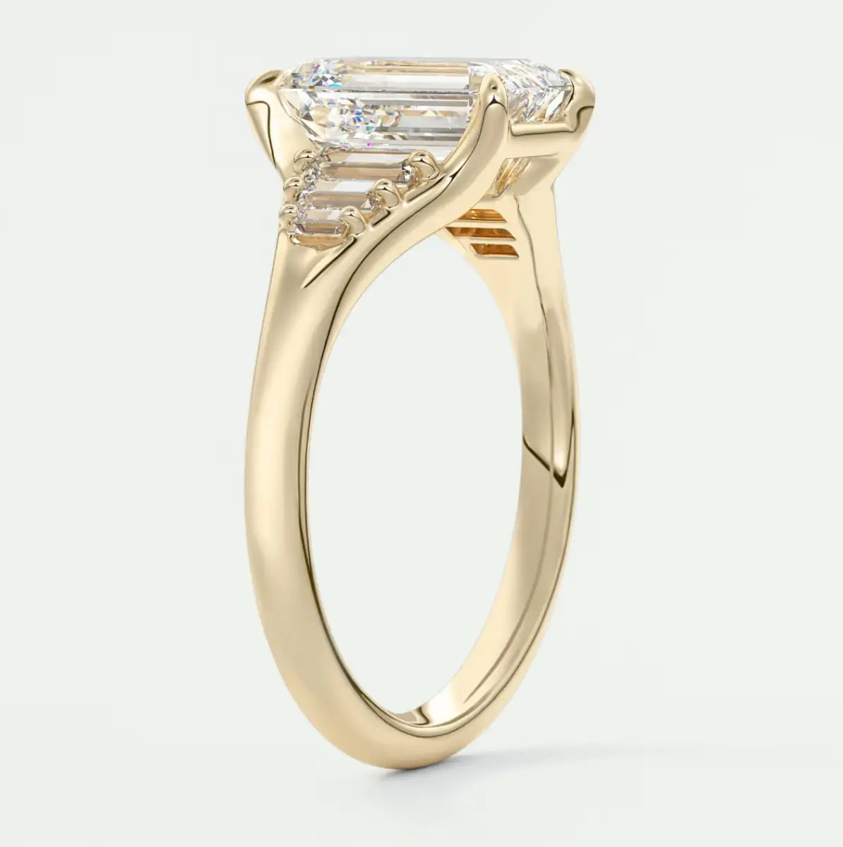 Custom made solena emerald split shank engagement ring with baguette side stones | diamond lab