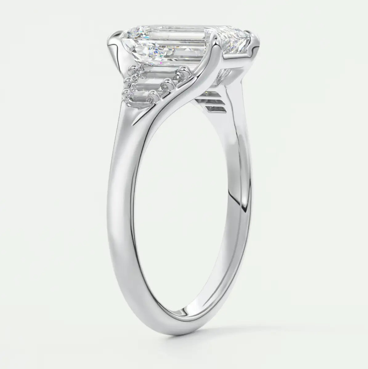 Custom made solena emerald split shank engagement ring with baguette side stones | diamond lab