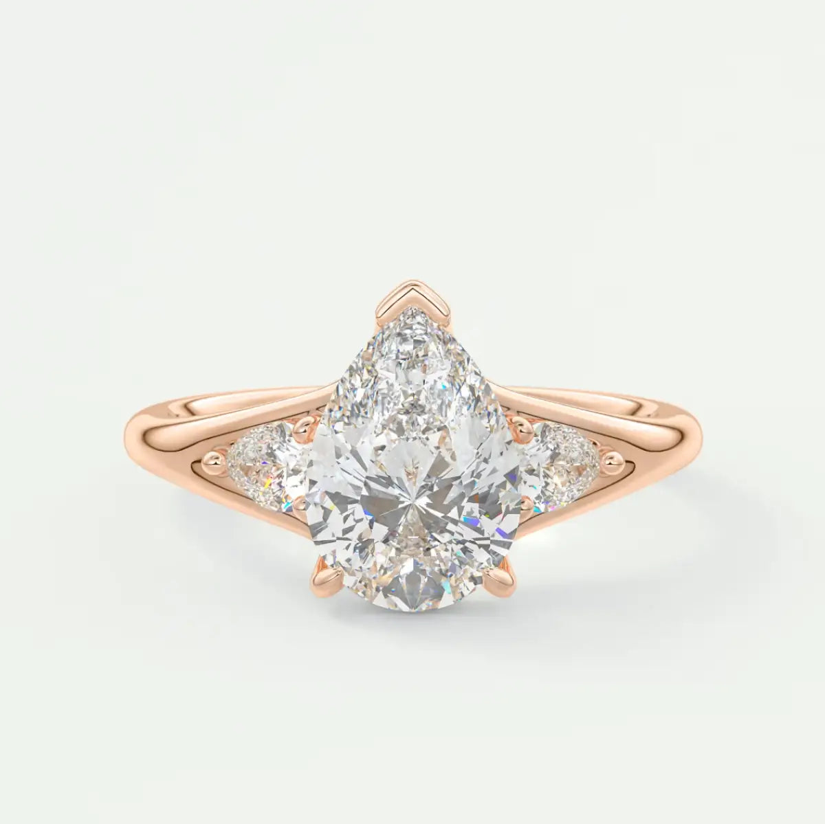 Custom made solena pear three-stone engagement ring with split shank | diamond lab
