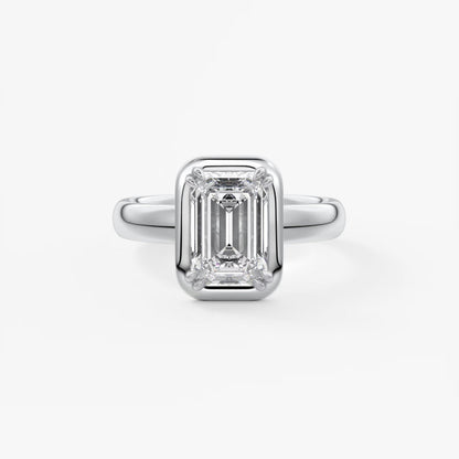 Custom made taylor grande emerald lab diamond bezel engagement ring | australia