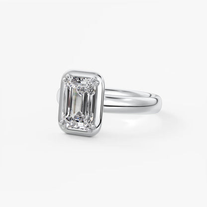 Custom made taylor grande emerald lab diamond bezel engagement ring | australia