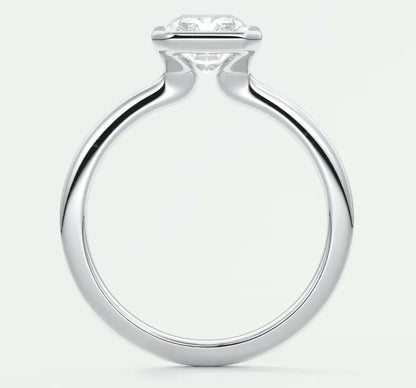 18k white gold engagement ring with a round diamond.